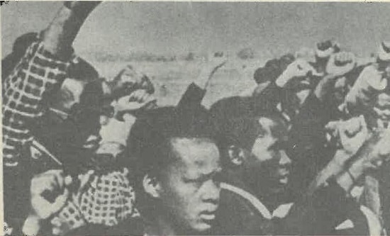 Mourners at the graveside of a Soweto massacre victim