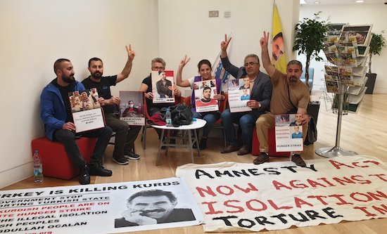 Supporters of Abdullah Ocalan occupy Amnesty International's offices lobby in London