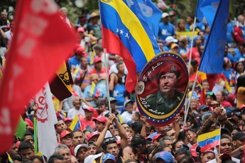 Venezuelans take to the streets to mark the death of Hugo Chavez
