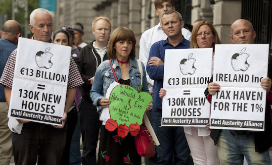 Protesters demand the Irish government claim billions in tax from Apple