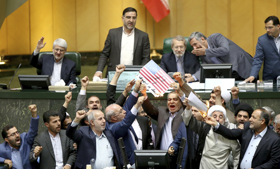 Iranian MPs burn US flag