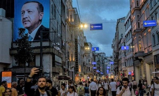 Istanbul high street with poster of Erdogan