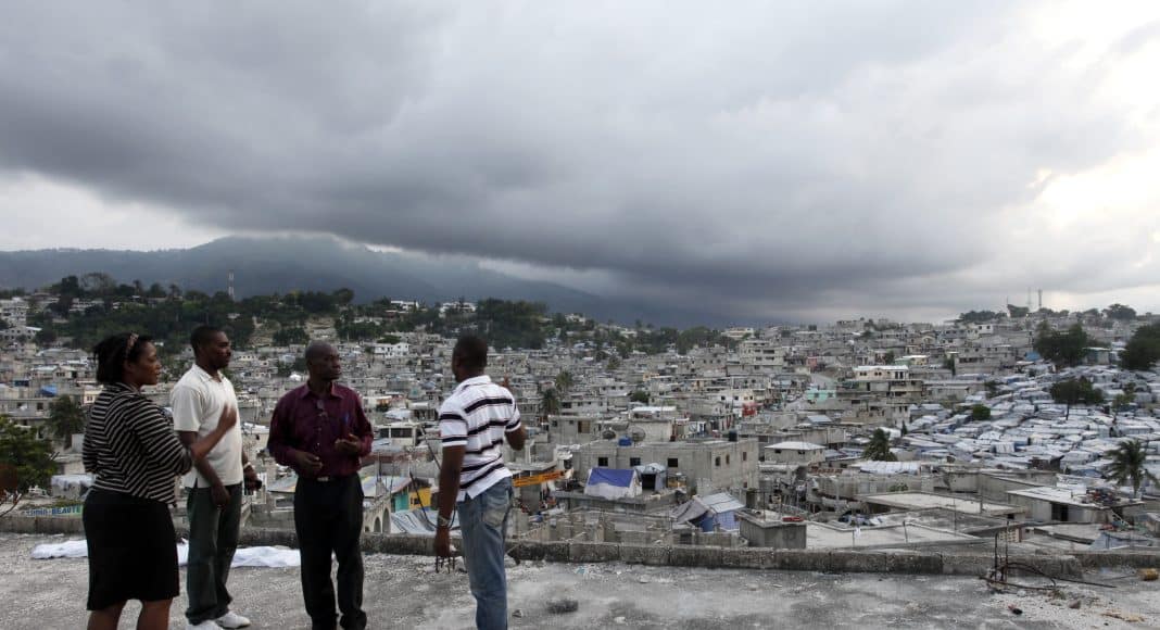 People from Delmas 32 talk while overlooking their neighborhood