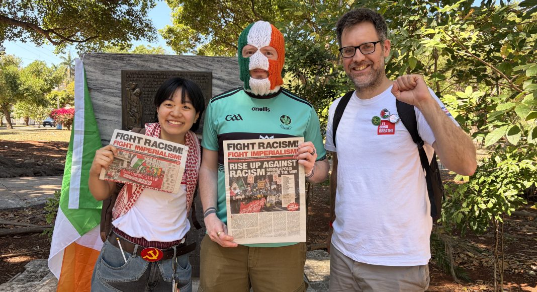 RCG comrades with DJ Próvai of Kneecap. DJ Provai is holding a copy of FRFI. (Photo: FRFI)